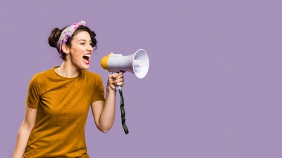 Woman-Shouting-Into-Megaphone-optimized FreePik